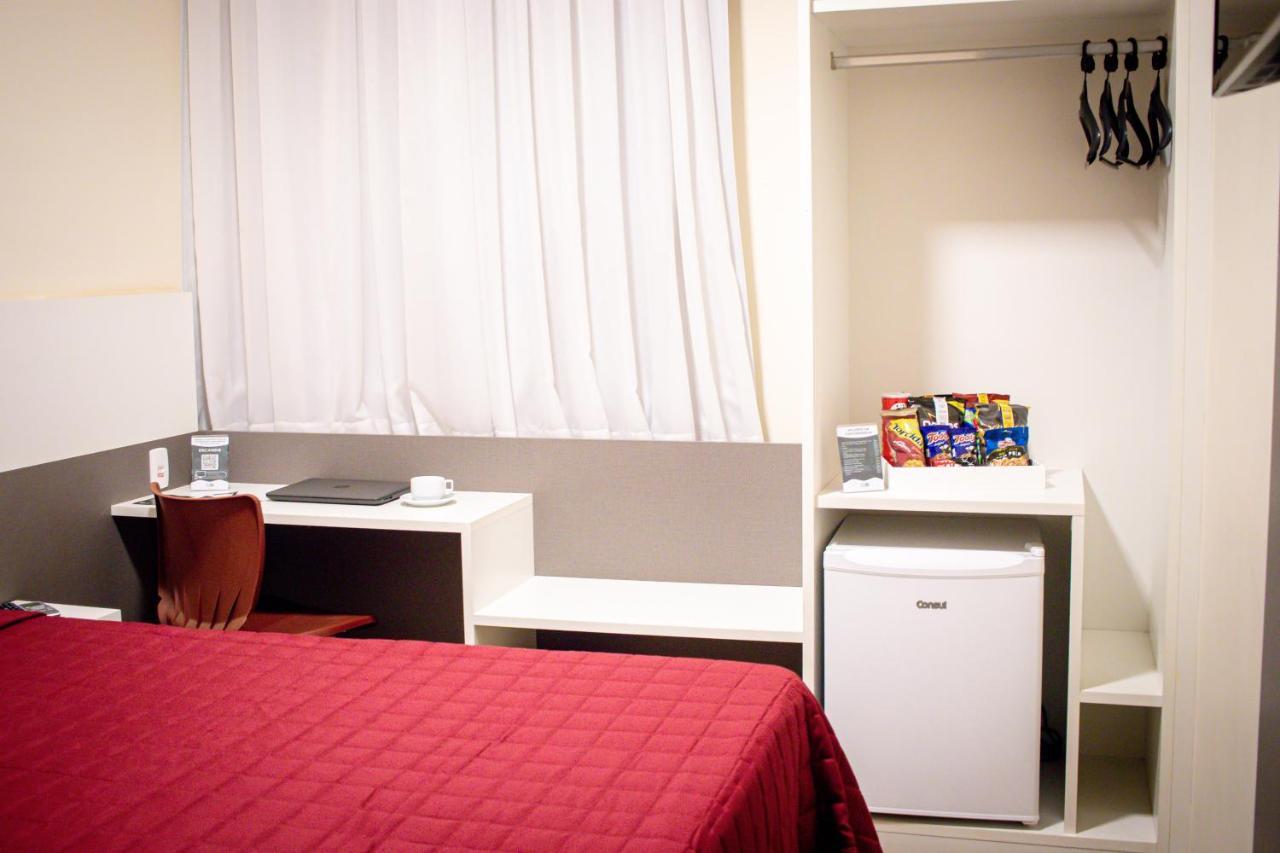 Hotel H2 Congonhas المظهر الخارجي الصورة A typical room at a capsule hotel