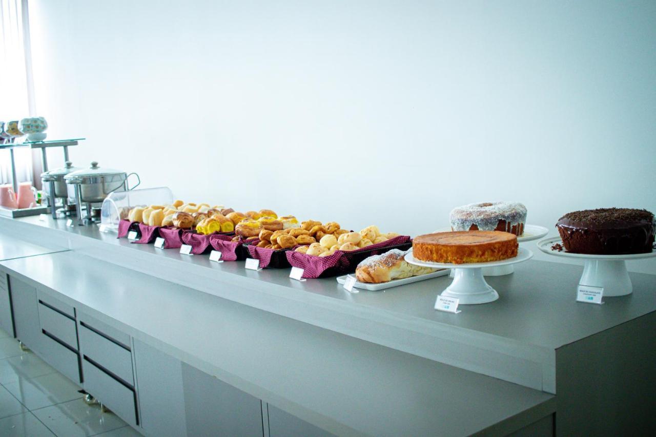 Hotel H2 Congonhas المظهر الخارجي الصورة A selection of cakes