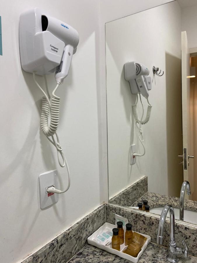 Hotel H2 Congonhas المظهر الخارجي الصورة A hair dryer in a hotel room